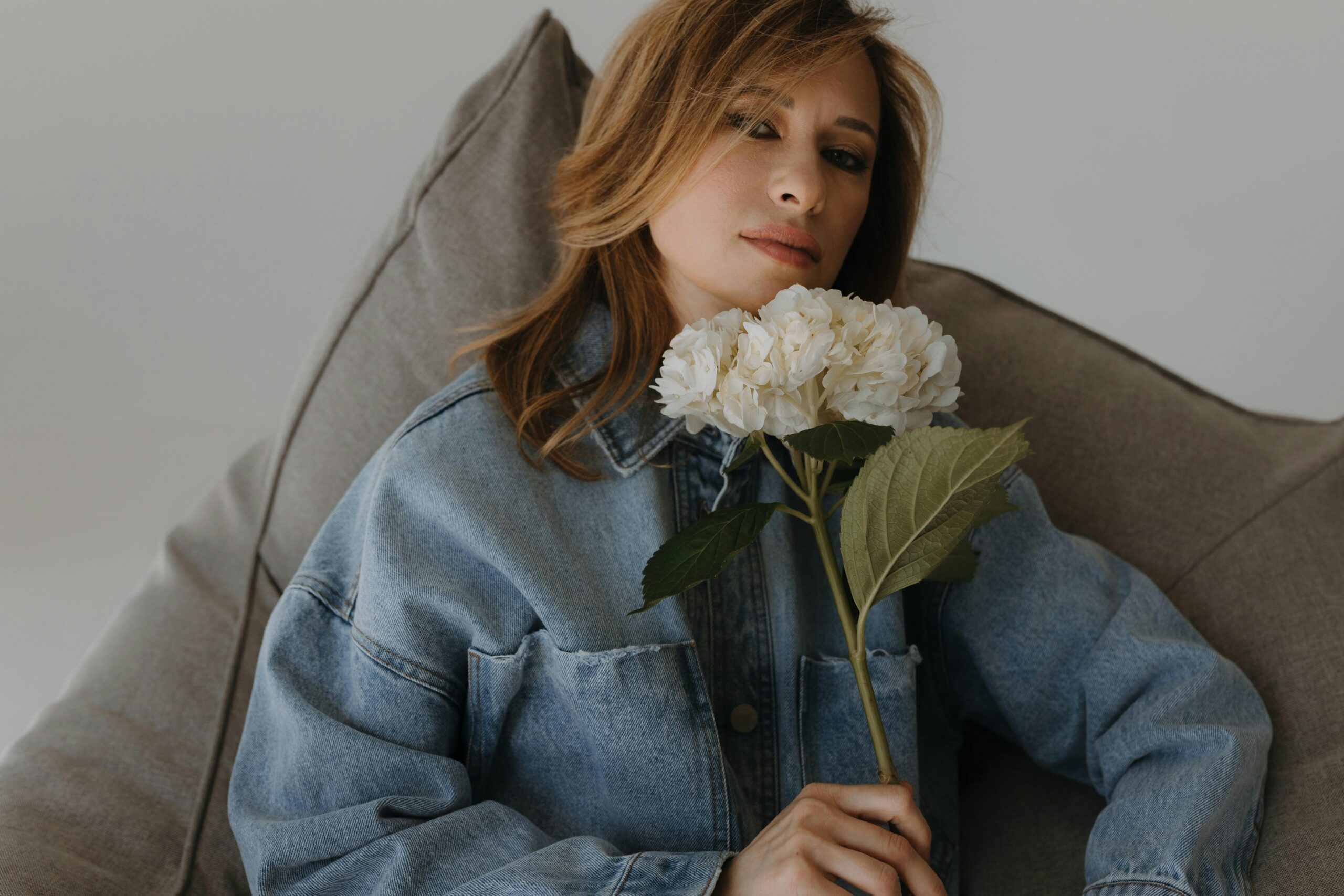 free-photo-of-portrait-of-woman-with-flower